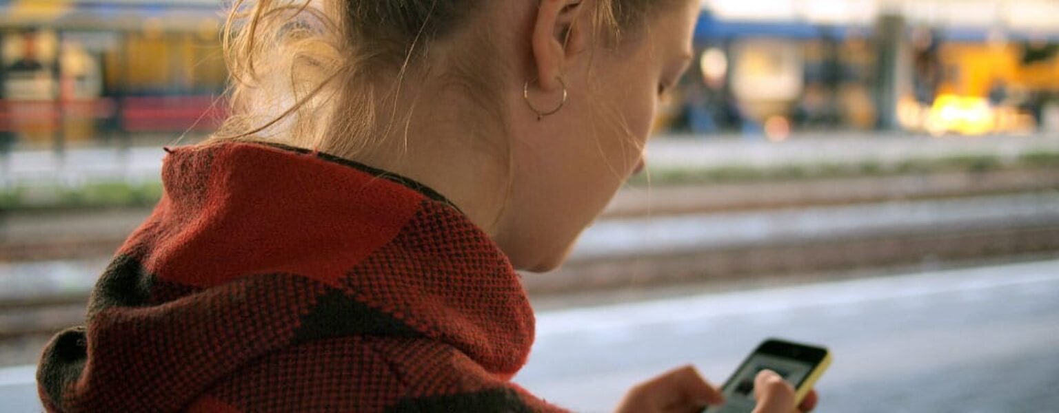 Phone Hacking Scams Woman trying to identify various phone hacking scams