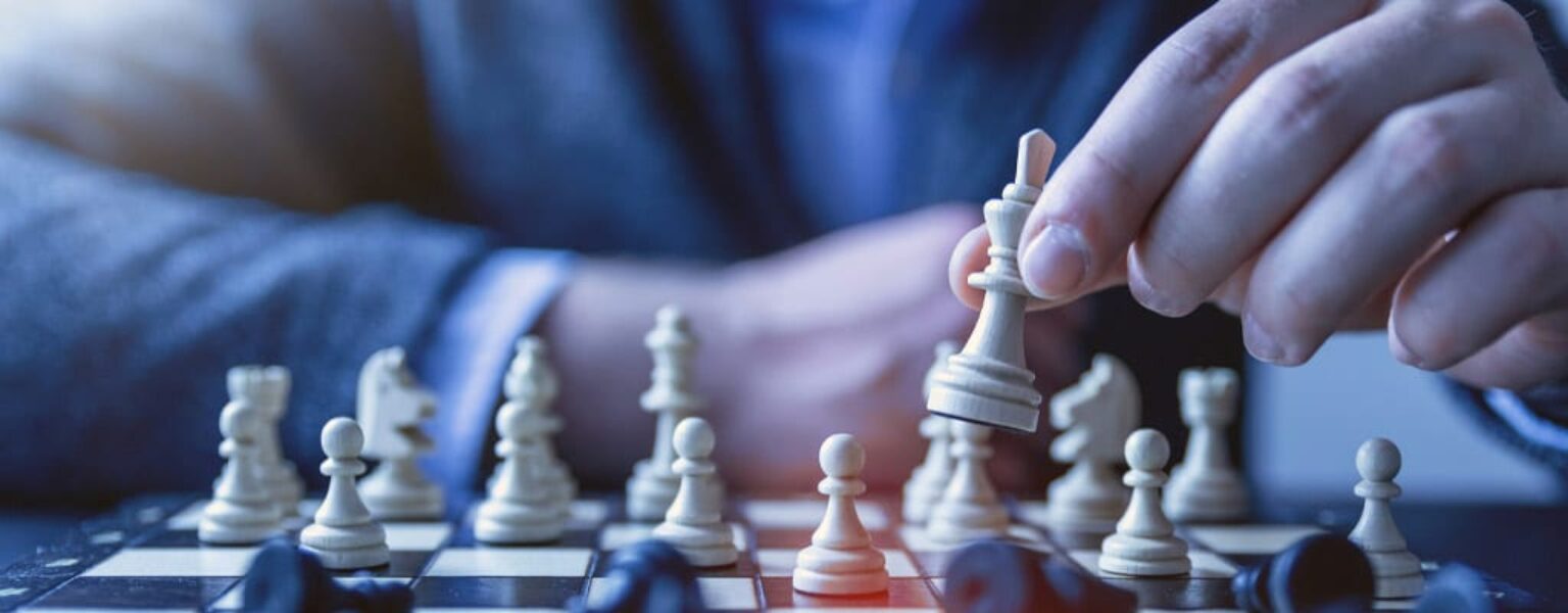 Business Continuity and Disaster Recovery plan Man playing chess to represent a business continuity and disaster recovery plan