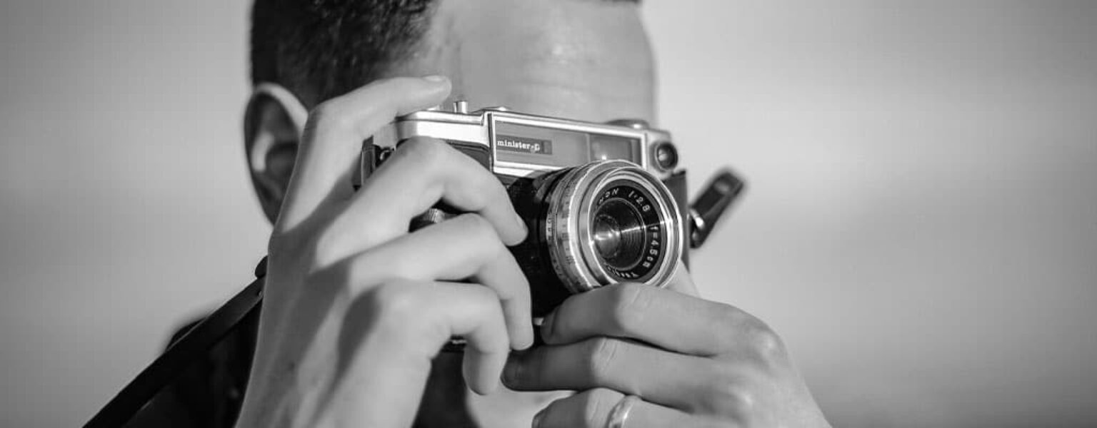 How to Make a Printer Print High Quality Man taking a photo for a high quality print