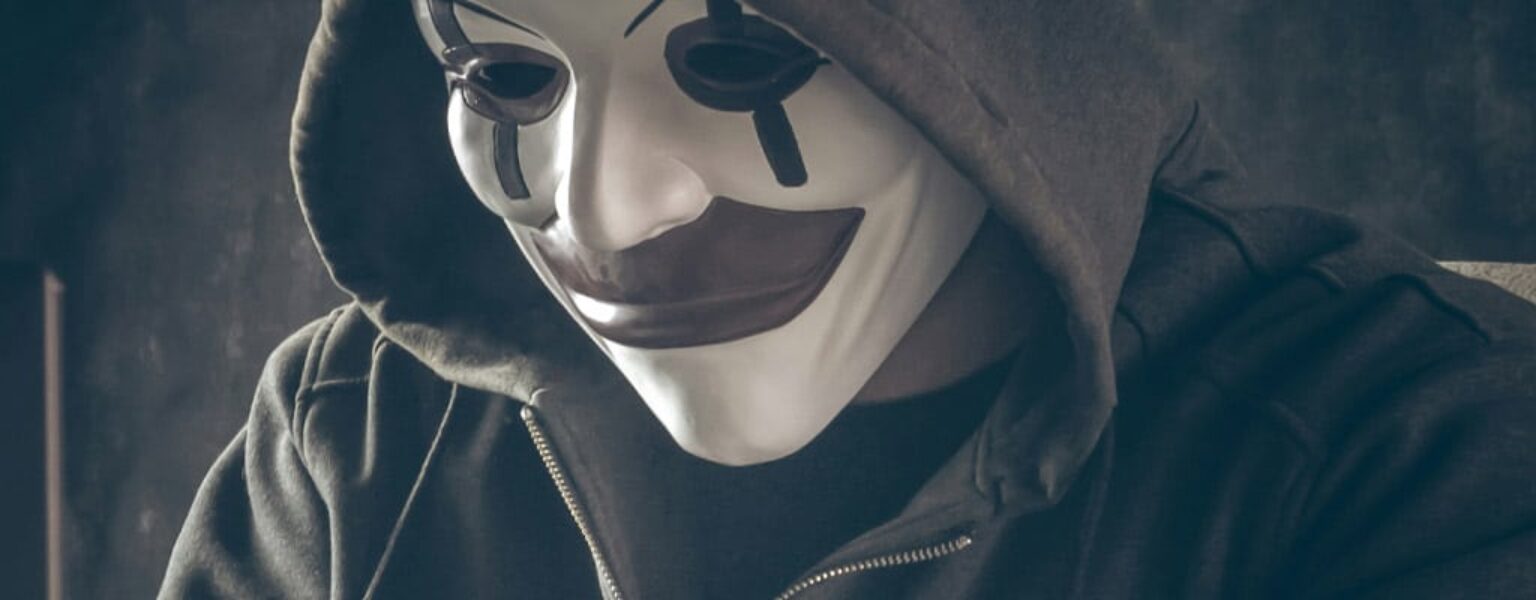 Hacker showing importance of knowing how to avoid ransomware attacks