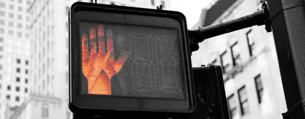 Do not walk sign representing zero trust and AI security