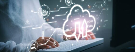 Person comparing Hyper V Replica VS Azure on a laptop