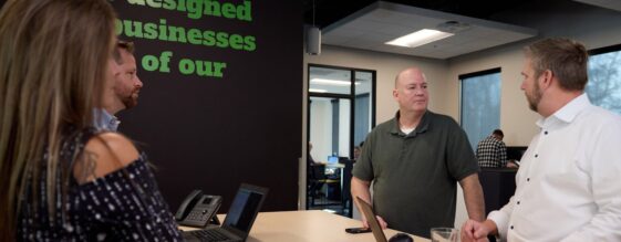 IT Asset Management IT Asset Management being explained to three people