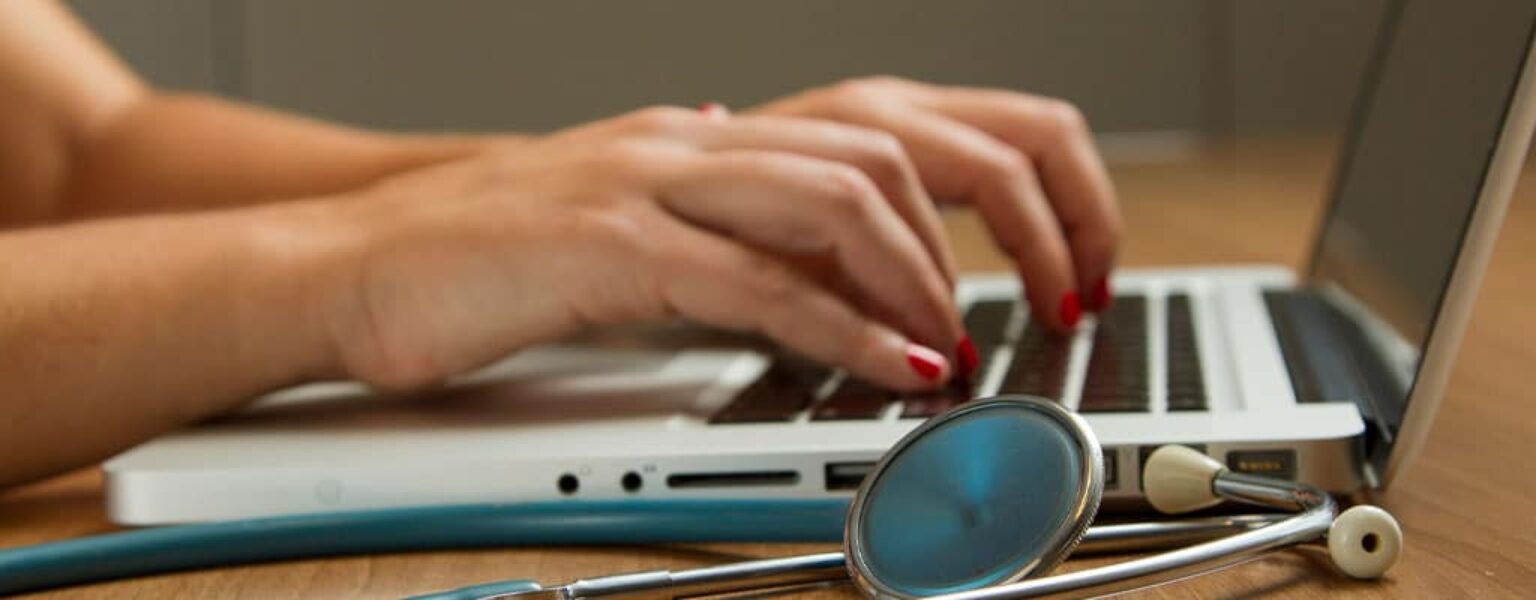 Small Business HIPAA Compliance Small business owner entering HIPAA compliance